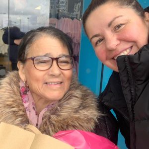Jackie out shopping with support worker