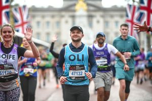 Oli running in the marathon