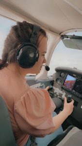 Alysia from On Track flying a plane