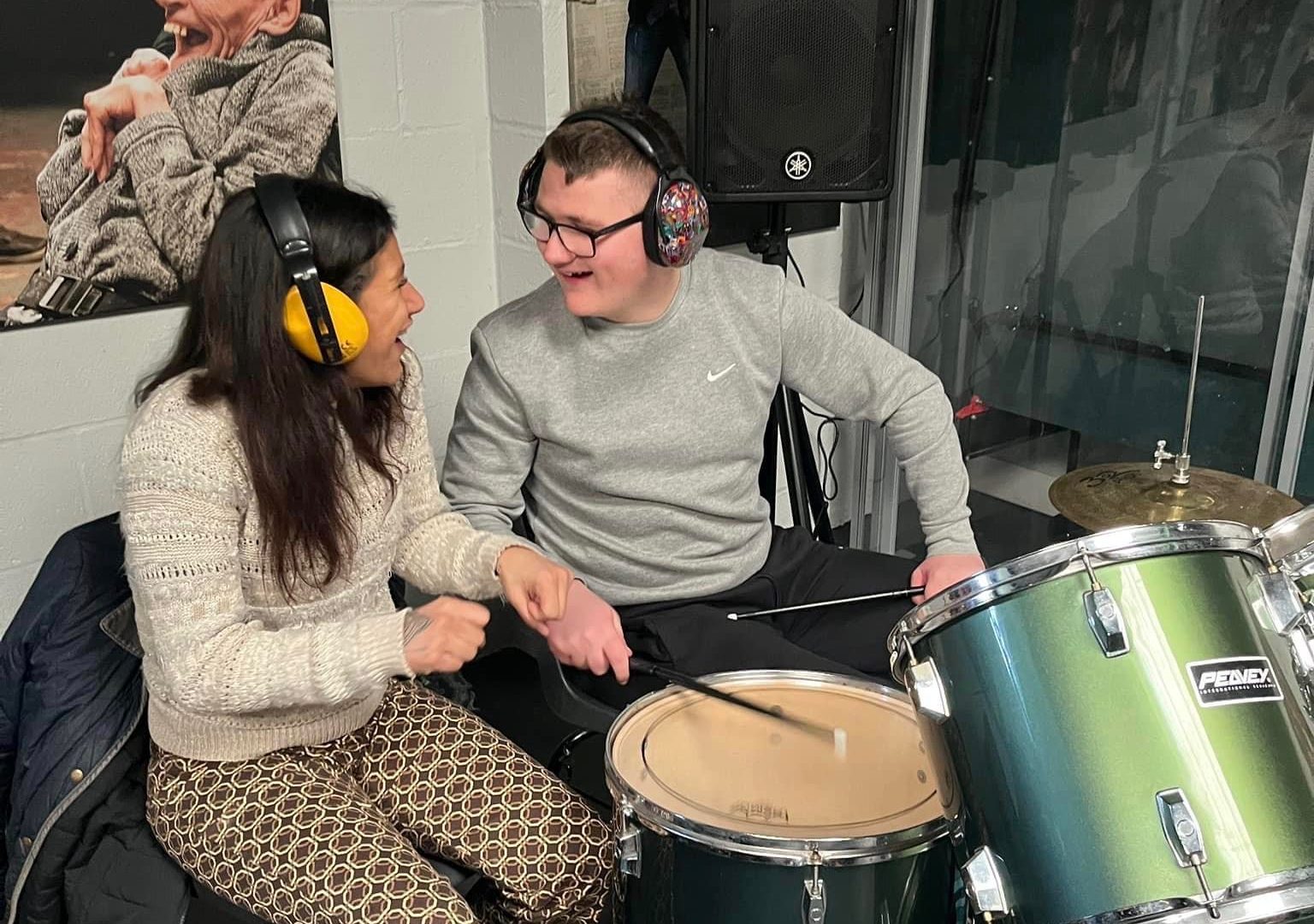 AJ playing the drums