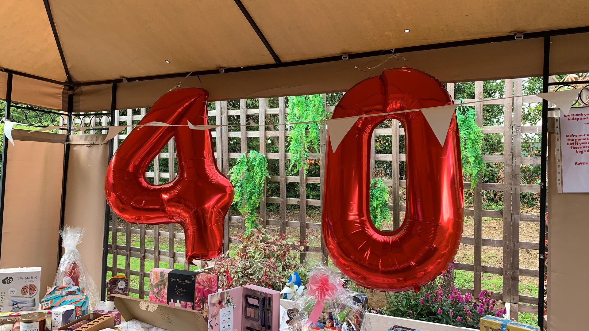 Stall and 40 balloons at the care homes celebration