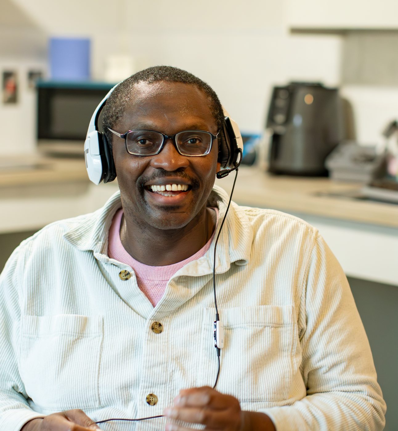 Stephen listening to his headphones