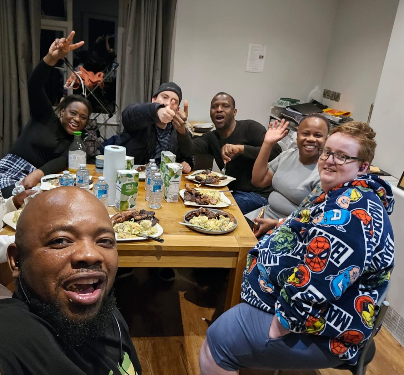 Charlie, Daniel and their housemates at the Christmas table