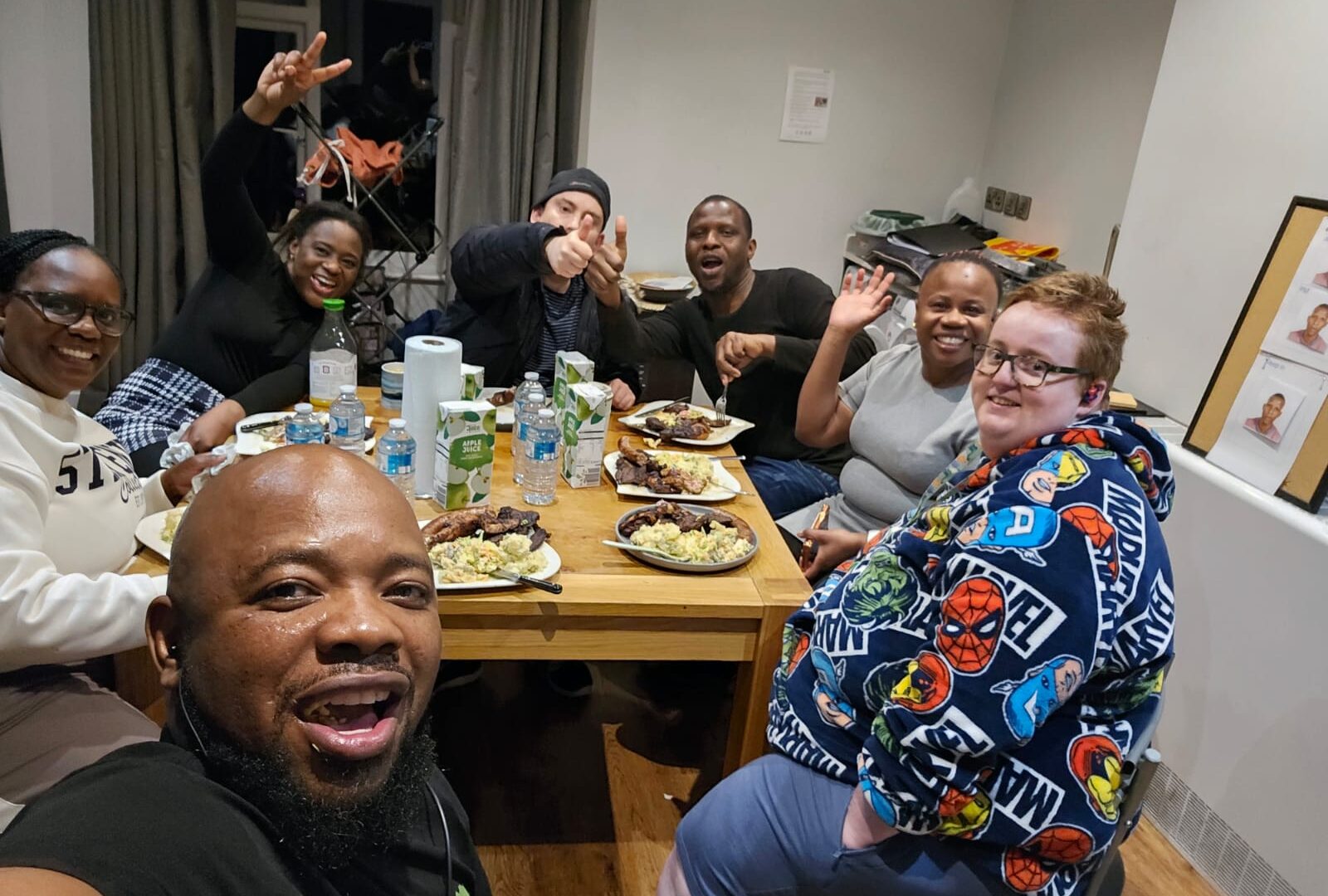 Charlie, Daniel and their housemates at the Christmas table