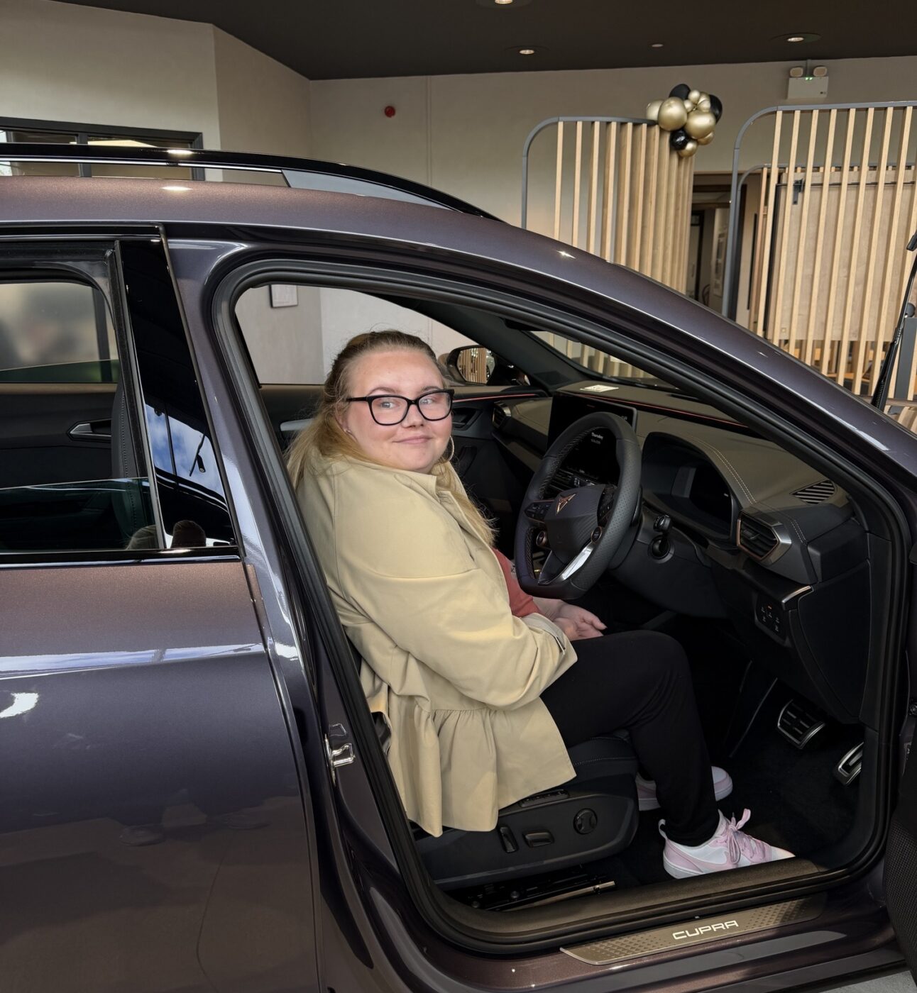 Beth in her new car