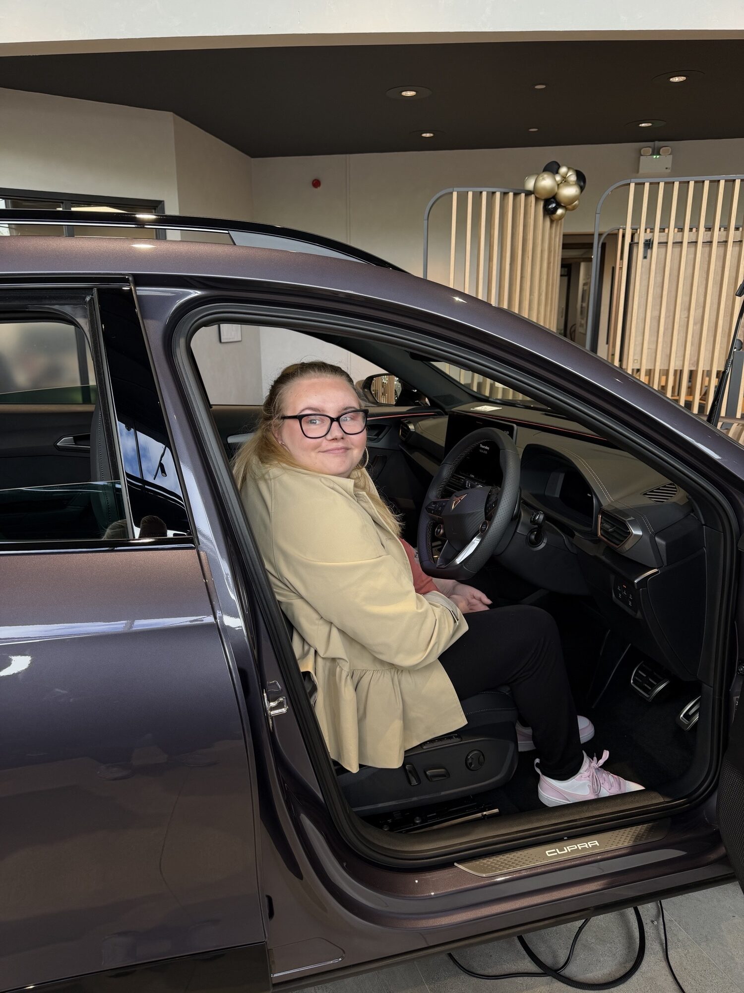 Beth in her new car