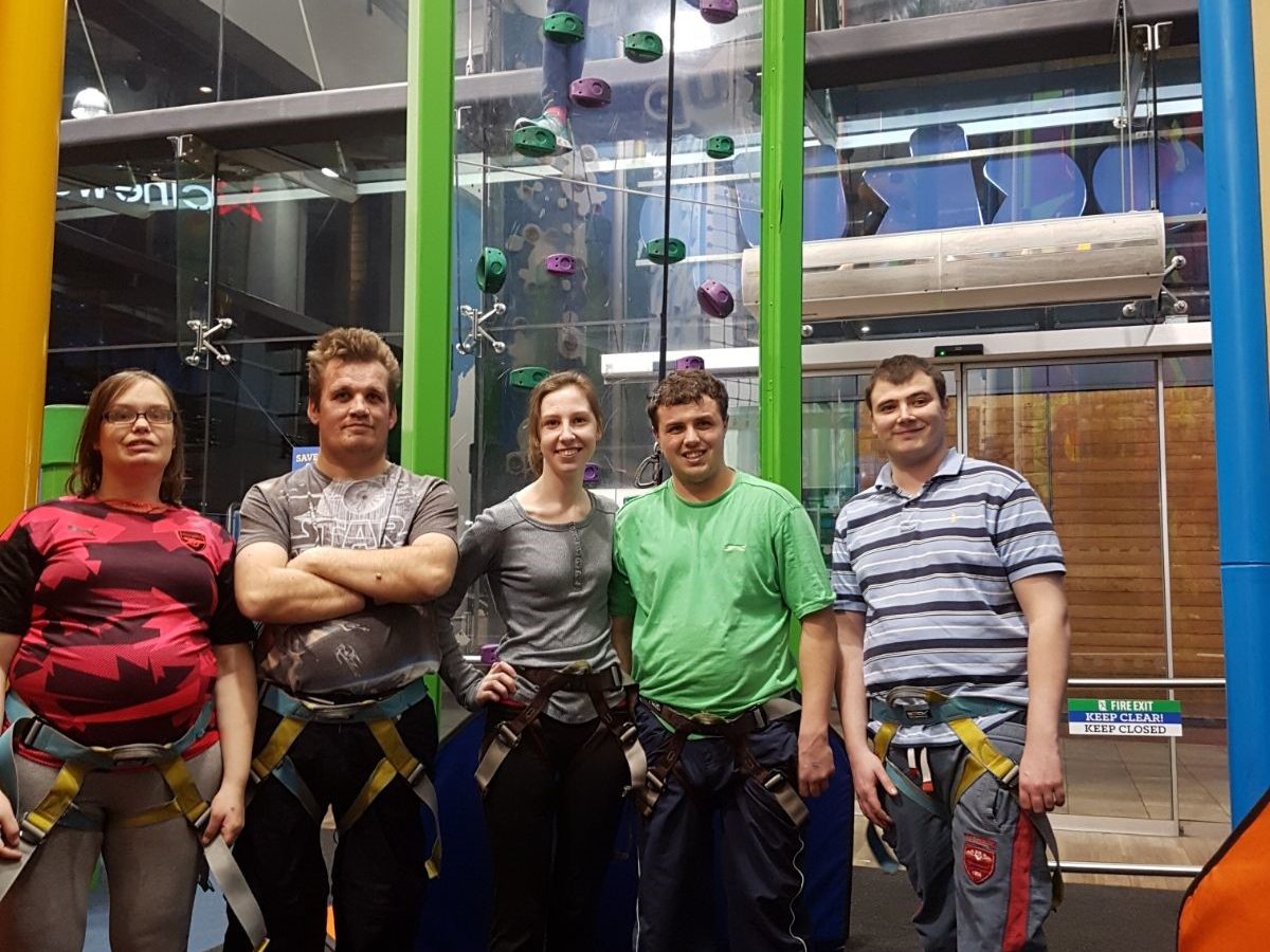 Members of Love4Life try rock climbing at Rock Up